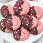 Chocolate covered strawberry cookies adorned with chocolate glaze and fresh strawberries