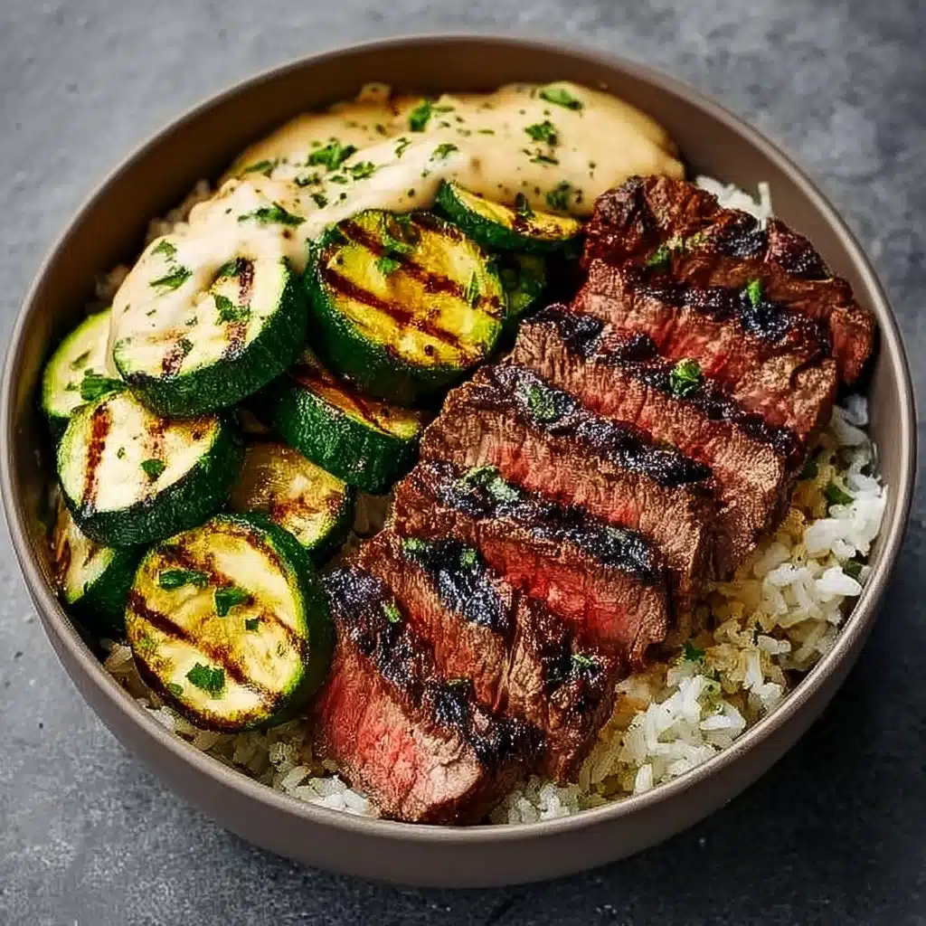 Delicious grilled steak bowl with sauce and grilled zucchini