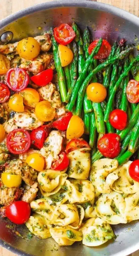 One-Pan Pesto Chicken with tortellini and colorful veggies