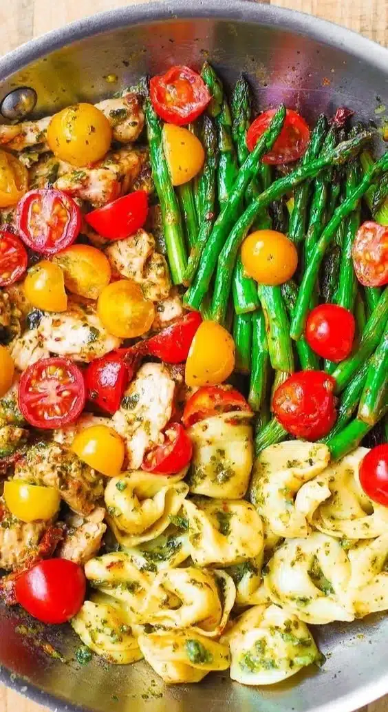 One-Pan Pesto Chicken with tortellini and colorful veggies