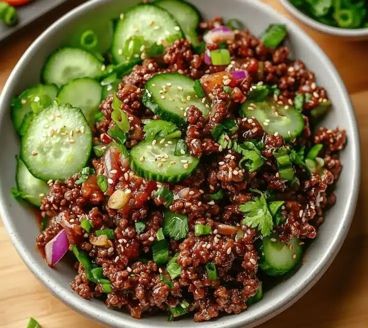 Delicious spicy Keto Korean Ground Beef served with a fresh salad
