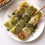 A plate of homemade cabbage dumplings filled with flavorful ingredients.
