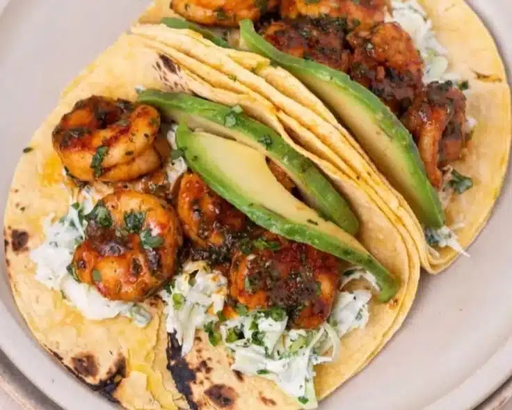 Cilantro Lime Shrimp Tacos with Creamy Slaw on a plate