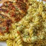 Creamy garlic parmesan pasta dish garnished with parsley
