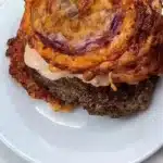 Low-Carb In-N-Out Burger with cheesy onion buns served on a plate