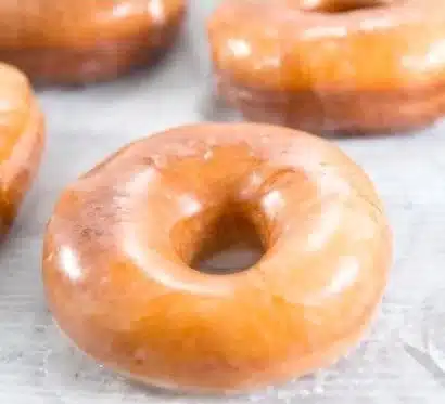 Homemade Dunkin Donuts-style glazed donuts on a plate