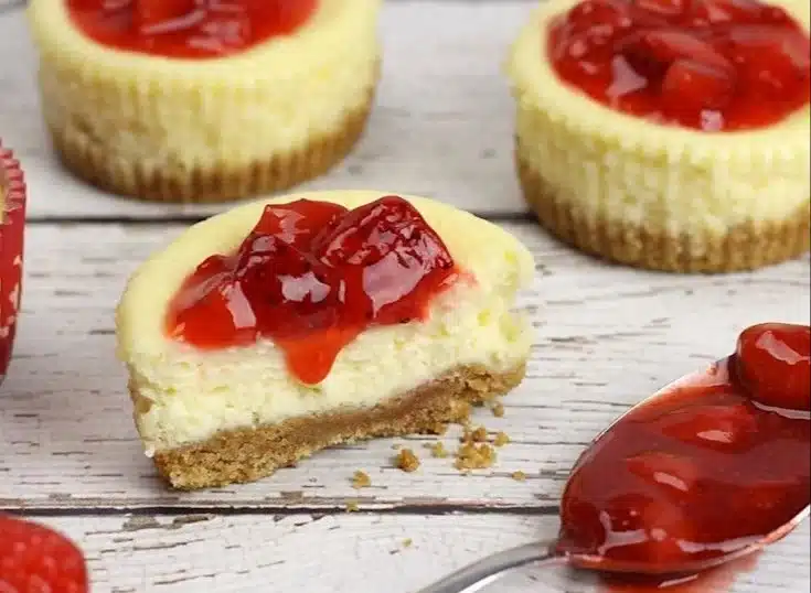 Plate of easy mini cheesecakes garnished with fresh berries