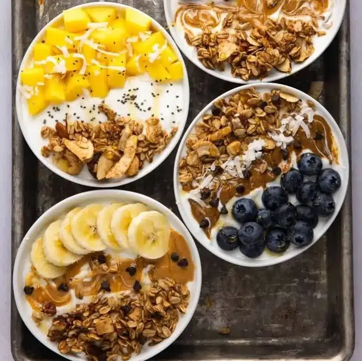 Delicious yogurt granola bowls with various toppings
