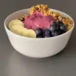 High protein breakfast smoothie bowl with fresh fruits and toppings