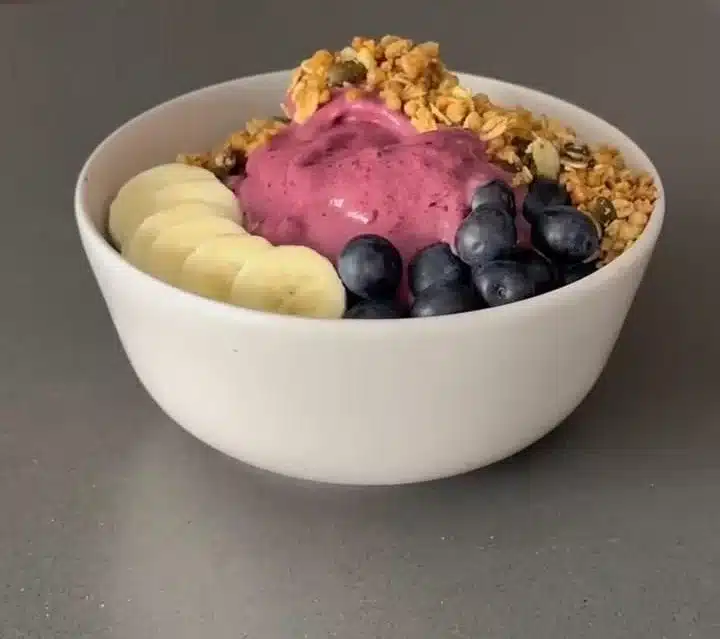 High protein breakfast smoothie bowl with fresh fruits and toppings