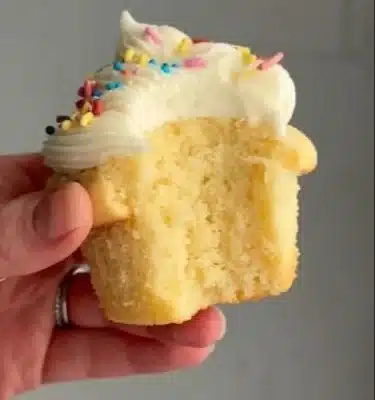 Delicious homemade Funfetti Cupcakes topped with colorful sprinkles