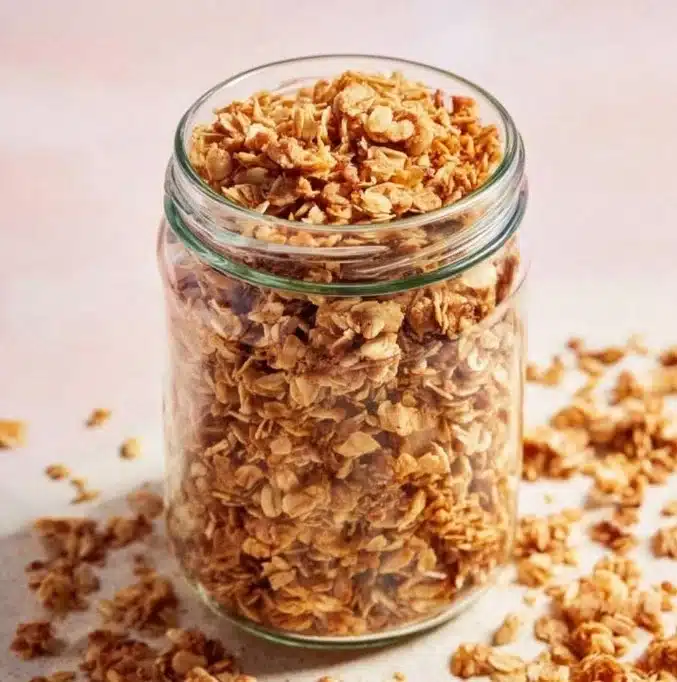 Bowl of homemade granola with nuts and dried fruits