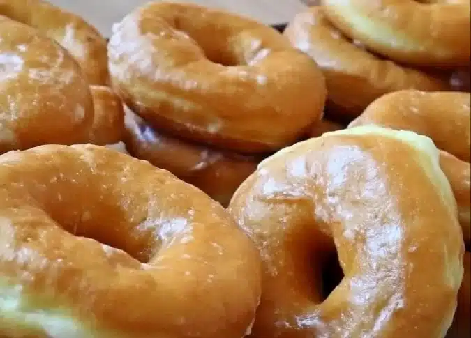 Mom’s homemade raised doughnuts with glaze and sprinkles
