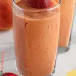 A colorful refreshing fruit smoothie made with fresh fruits and yogurt