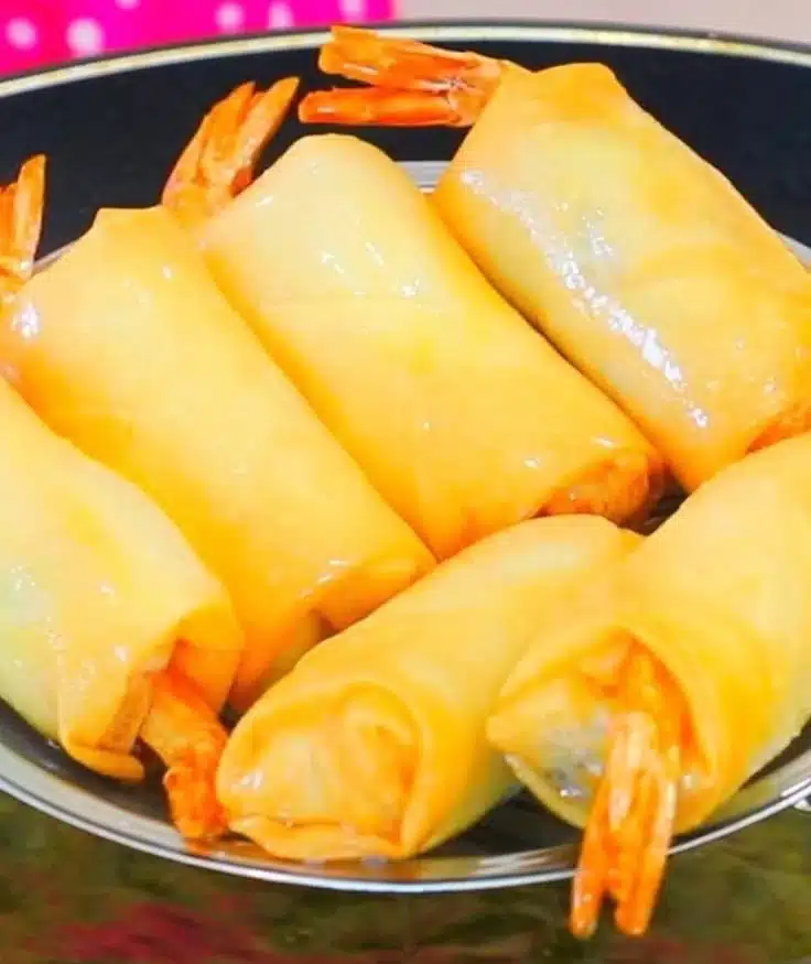 Fresh shrimp spring roll served with dipping sauce on a plate