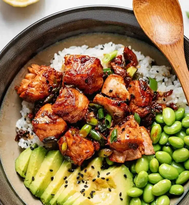 Delicious Teriyaki Salmon Bowl garnished with fresh vegetables