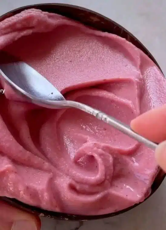 Delicious strawberry banana smoothie bowl topped with fresh fruits.