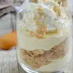 Delicious Banana Cream Pie Yogurt Parfaits in a clear glass dish