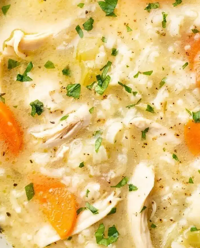 Bowl of homemade Chicken Rice Soup with tender chicken and rice in broth