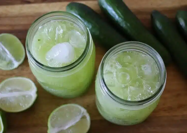 Refreshing Cucumber Lime Water in a glass with cucumber slices and lime