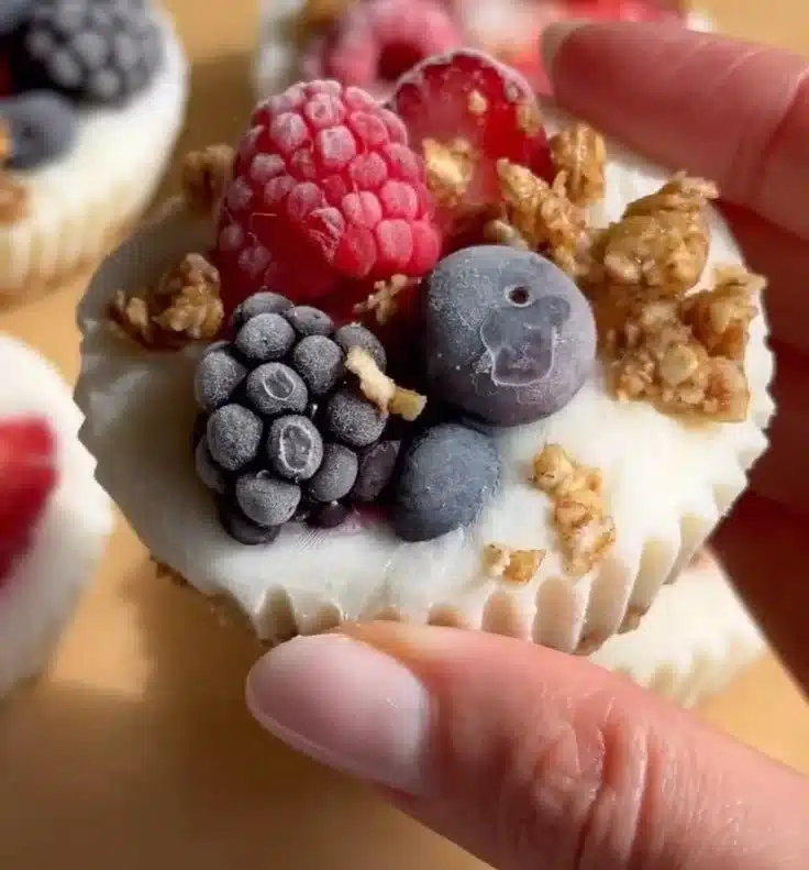 Frozen yogurt granola cups ready to be enjoyed as a healthy snack.