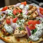 Mediterranean Tzatziki Chicken topping on naan pizza